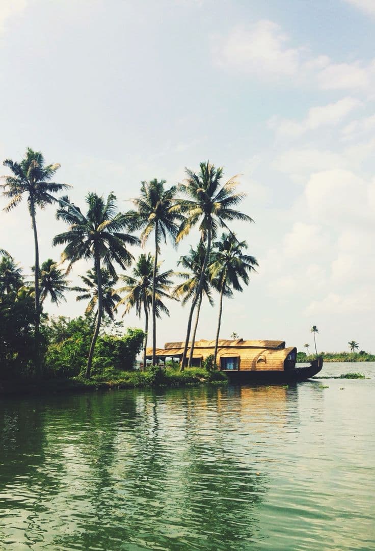 Expansive waters of Vembanad Lake in Alleppey, the longest lake in India and a prime hub for Kerala backwater tourism